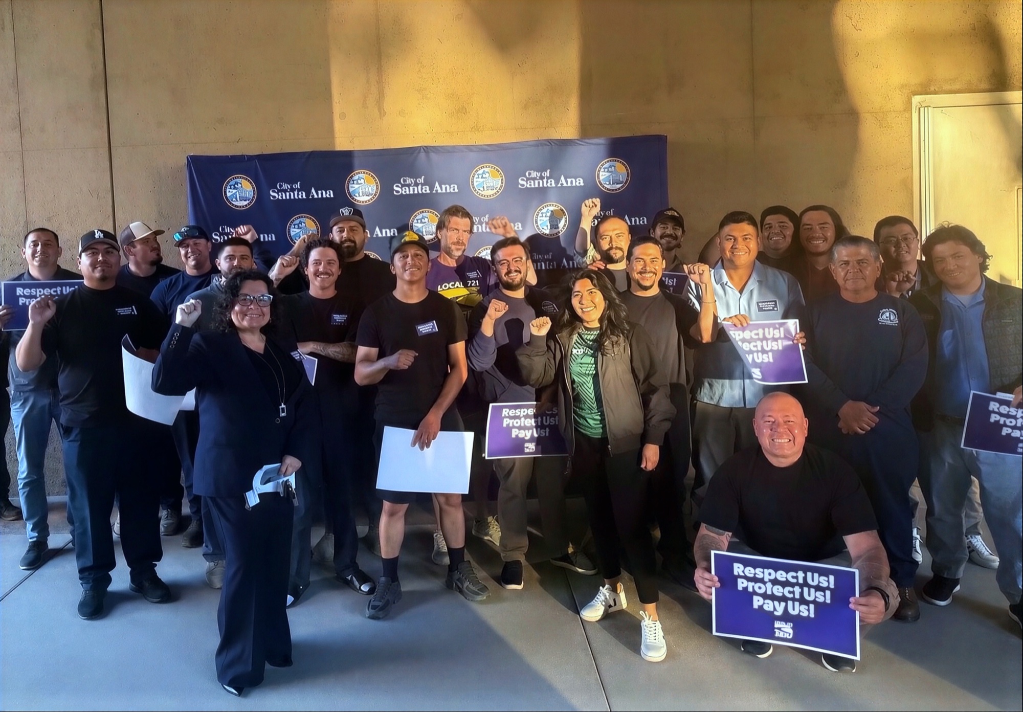 Santa Ana SEIU 721 members pack council chambers in purple shirts