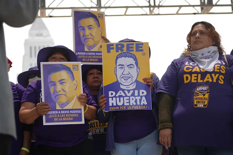 Signs at union rally: "Free David Huerta"