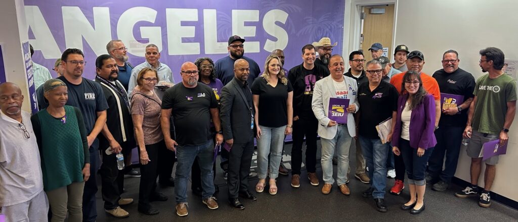 Union members stand for a commemorative photo with LACERS Pension Board candidate Angela Ragusa.